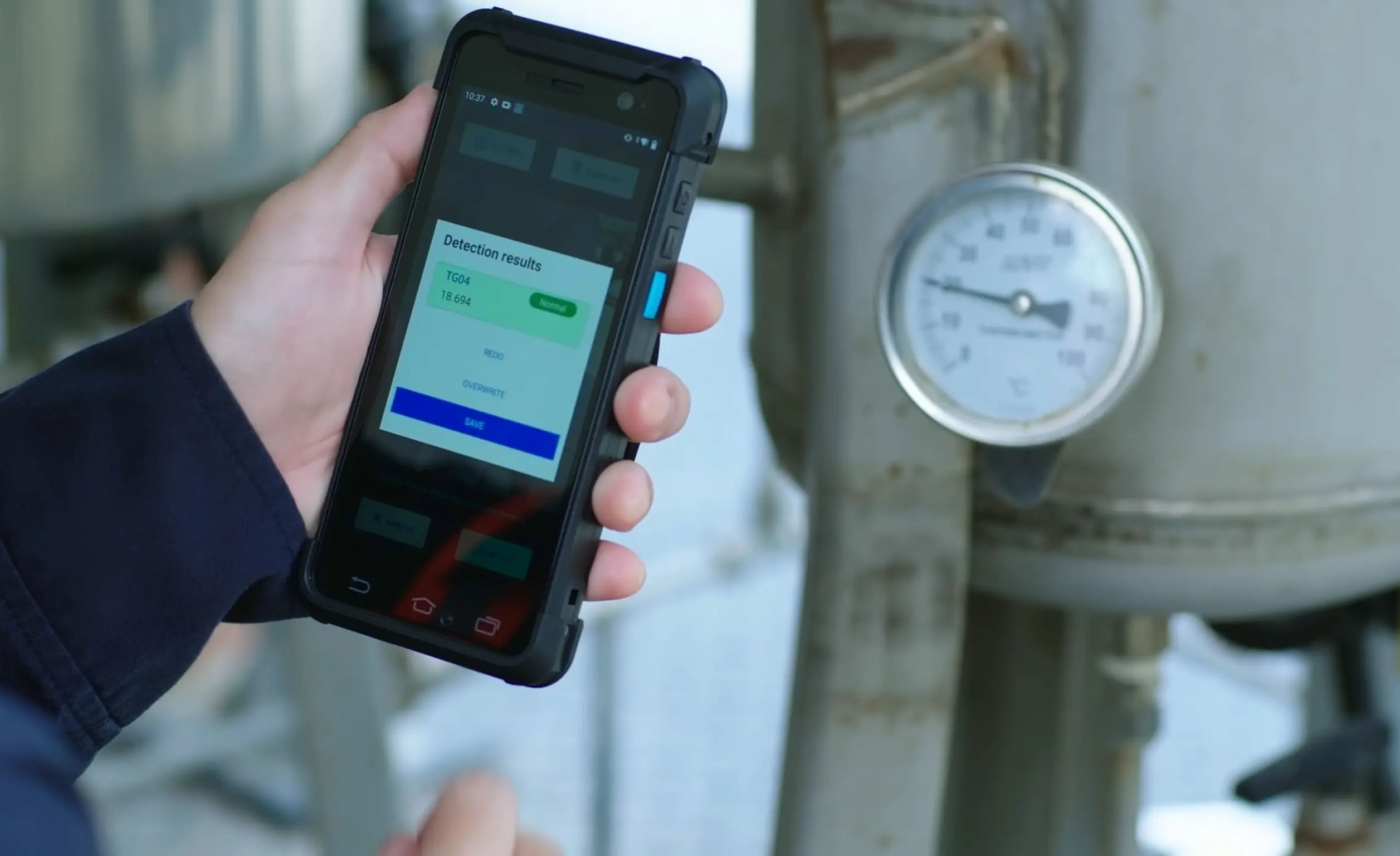 Using handheld device to check gauge